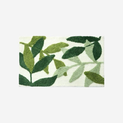 Felpudo de entrada con hojas verdes