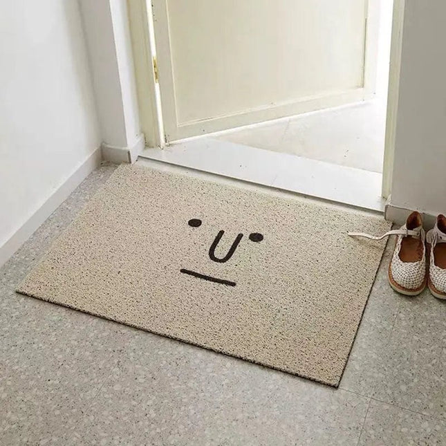 Felpudo gris original con cara