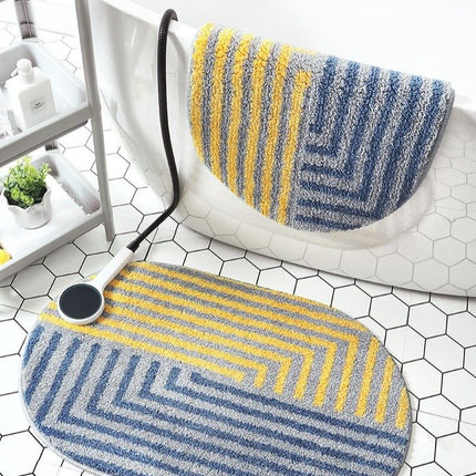 Alfombra de baño geométrica amarilla y azul