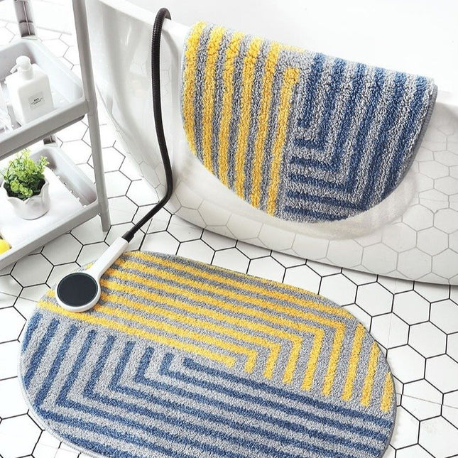 Alfombra de baño geométrica amarilla y azul