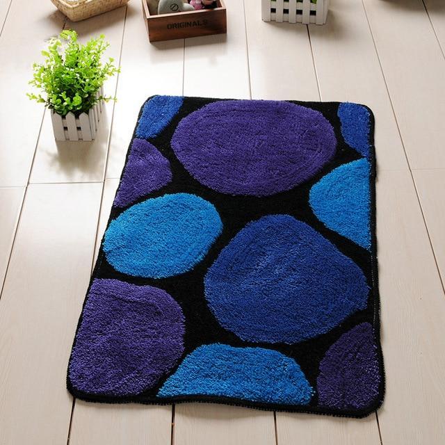 Alfombra de baño azul diseño piedras