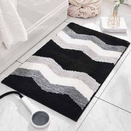 Alfombra de baño negra y blanca