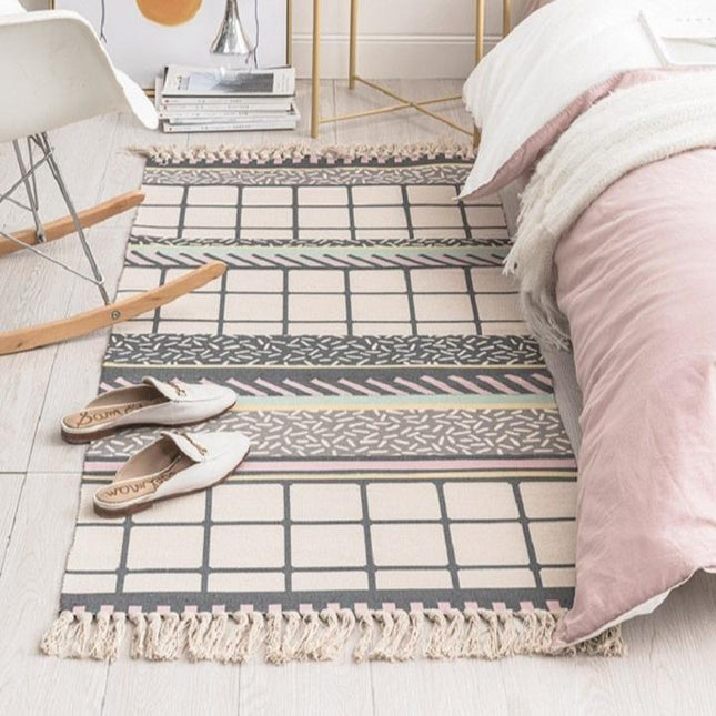 Alfombra rosa empolvado y beige