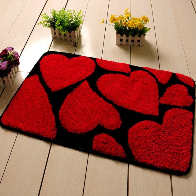 Alfombra de baño con forma de corazón