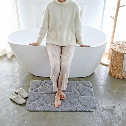 Alfombra de baño con relieve guijarros