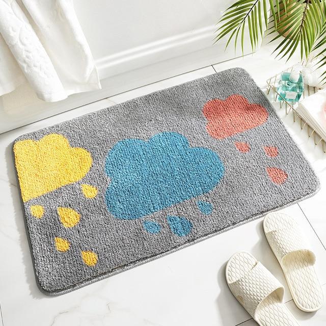 Alfombra de baño infantil con nubes