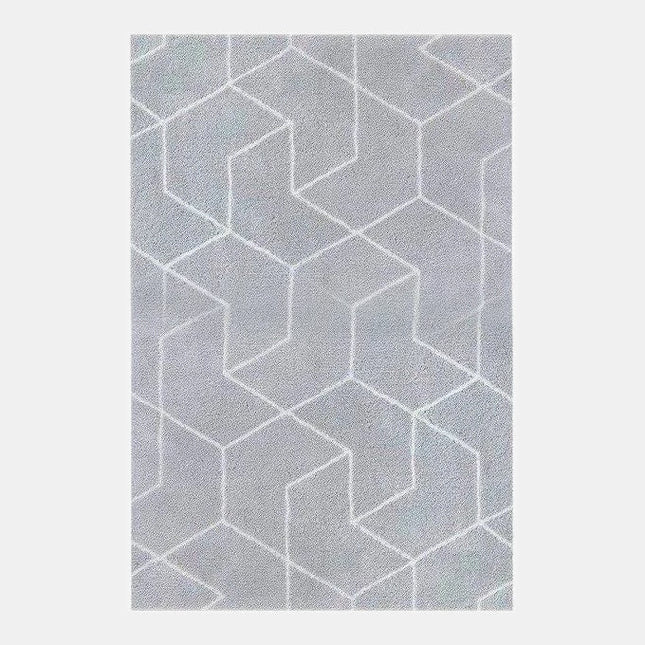 Alfombra shaggy gris con motivos geométricos.